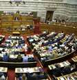 O primeiro-ministro da Grécia, Alexis Tsipras, discursa para os legisladores durante uma sessão de emergência no Parlamento para discutir o referendo marcado para 5 de julho  Foto: Petros Karadjias / AP
