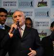Ao lado de Cunha, Temer diz que PMDB quer ser cabeça de chapa nas eleições presidenciais de 2018  Foto: Antônio Cruz / Agência Brasil