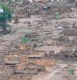 Imagem mostra destruição momentos após o vazamento da barragem da mineradora Samarco, em Mariana  Foto: Agência Brasil