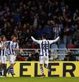 Jogadores da Real Sociedad comemoram gol  Foto: EFE