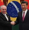 Em primeiro encontro bilateral, presidente brasileiro diz querer intensificar "sólida relação que foi construída ao longo do tempo" com a China  Foto: Getty Images