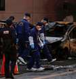 Policiais examinam carro que pegou fogo em Utsunomiya, no Japão  Foto: EFE