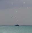 Barcos de resgate na costa de Sochi, na Rússia  Foto: EFE