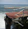 Há um ano, o desabamento de parte da ciclovia Tim Maia, na Avenida Niemeyer, durante uma ressaca no mar de São Conrado, deixou dois mortos  Foto: Agência Brasil