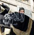 Combatentes da Frente Al-Nusra, braço do EI na Síria, em foto de arquivo  Foto: BBC News Brasil