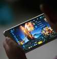 Criança joga "Honour of Kings" no celular
02/07/2017 REUTERS/Stringer  Foto: Reuters