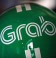 Capacete para moto da Grab em exposição durante conferência com jornalistas pelo 5º aniversário da empresa em Cingapura
6/06/2017 REUTERS/Edgar Su  Foto: Reuters