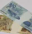 Foto ilustrativa com notas de 50 e 100 reais
13/12/2013 REUTERS/Ricardo Moraes  Foto: Reuters