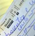 Em queda: cheques devolvidos em junho atingiram 1,83% contra 1,80% de setembro de 2014  Foto: Agência Brasil