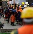 Membro da equipe de resgate argentina trabalha junto aos mexicanos na busca por corpos e sobreviventes  Foto: Reuters