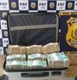 Mala com R$ 700 mil apreendida pela PRF  Foto: Agência Brasil