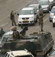 Veículos militares e soldados patrulham ruas de Harare
 15/11/2017    REUTERS/Philimon Bulawayo  Foto: Reuters