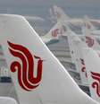 Aviões da Air China são vistos estacionados em aeroporto internacional de Pequim, China 
28/03/2016 REUTERS/Kim Kyung-Hoon/File Photo  Foto: Reuters