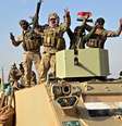 Soldados iraquianos comemoram vitória contra jihadistas do EI em Rawa  Foto: DW / Deutsche Welle