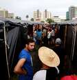 Movimentos de esquerda já estão acampados em Porto Alegre  Foto: Reuters / BBC News Brasil