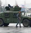 Agentes da polícia afegã são vistos perto de local de ataque contra a academia militar Marshal Fahim em Cabul, Afeganistão 29/01/2018 REUTERS/Mohammad Ismail  Foto: Reuters