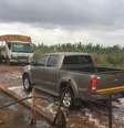 Visitantes em Matanuska precisam desinfetar os pés e as rodas dos carros antes de entrar na fazenda  Foto: BBC News Brasil