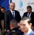 Primeiro-ministro palestino, Rami Hamdallah, chega a cerimônia após explosão perto de comboio, na Faixa de Gaza 13/03/2018 REUTERS/Mohammed Salem  Foto: Reuters