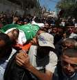 Palestinos carregam corpo de homem morto por forças israelenses durante protesto em Gaza 15/05/2018 REUTERS/Ibraheem Abu Mustafa  Foto: Reuters