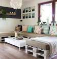 1. Sofá de palete em U, que deixou o ambiente confortável e gracioso  Foto: Viva Decora