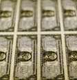 Notas de dólar dos EUA fotografados em Washington, EUA
14/11/2014
REUTERS/Gary Cameron  Foto: Reuters