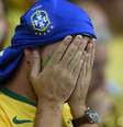 Torcedor brasileiro desolado na partida Brasil x Alemanha, na Copa de 2014, o fatídico 7 a 1  Foto: Getty Images / BBC News Brasil