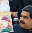 Maduro exibe modelo de novo bilhete de 100 bolívares  Foto: DW / Deutsche Welle
