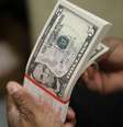 Notas de dólar dos EUA 
26/03/2015
REUTERS/Gary Cameron  Foto: Reuters