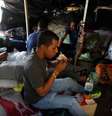 Imigrantes venezuelanos perto de estação de ônibus em Quito
 24/8/2018    REUTERS/Daniel Tapia   Foto: Reuters