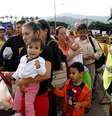 Venezuelanos cruzam a ponte internacional Simon Bolívar, na fronteira com a Colômbia  Foto: ANSA / Ansa - Brasil