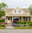 Casa florida de Baddeck, Nova Escócia  Foto: mikeinlondon / iStock
