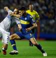 Barcos e Magallan disputam bola  Foto: Demian Alday / Getty Images 