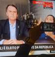 Eleitores assistem ao primeiro pronunciamento do presidente eleito Jair Messias Bolsonaro (PSL)  Foto: MARCELO FONSECA / Estadão