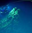 Imagens feitas por veículos robóticos usados para explorar a Fossa das Marianas, área mais profunda do planeta, permitiram a descoberta  Foto: Bill Chadwick/NOAA / BBC News Brasil