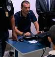 Homem que matou a família presta depoimento  Foto: Polícia Civil/Divulgação / Estadão