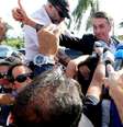 Bolsonaro foi recepcionado por apoiadores em Brasília  Foto: Ernesto Rodrigues / Estadão Conteúdo