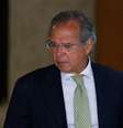 O ministro da economia, Paulo Guedes, durante cerimônia de assinatura do decreto que flexibiliza a posse de armas no Brasil  Foto: Walterson Rosa / Framephoto / Estadão