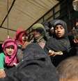 Crianças na parte de trás de caminhão perto de Baghouz, na Síria
20/02/2019 REUTERS/Rodi Said  Foto: Reuters