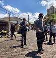 Policiais em frente à escola de Suzano, palco de massacre  Foto: Caio Spechoto  / Redação Terra