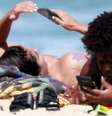 Anitta faz topless na praia da Barra da Tijuca nesta terça-feira, dia 26 de março de 2019  Foto: AGNews, Dilson Silva / PurePeople