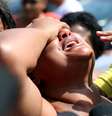 Luciana Nogueira, esposa do músico Evaldo dos Santos Rosa, morto no último domingo, 7 de abril de 2019, durante uma ação do Exército na região da Vila Militar, na zona norte do Rio de Janeiro, se emociona ao falar com a imprensa na sua chegada no Instituto Médico Legal (IML), no centro da cidade, na manhã desta segunda-feira, 8. O carro onde o músico estava com a família teria sido confundido com o de bandidos que estavam agindo na região.  Foto: Wilton Junior / Estadão