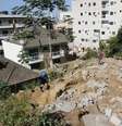 Pelo menos duas pessoas morreram e outras quatro ficaram feridas em um desabamento de dois prédios, no início da manhã desta sexta-feira (12), na Muzema, na Zona Oeste do Rio. A comunidade liga o Rio das Pedras ao Itanhangá, pela Estrada de Jacarepaguá  Foto: REGINALDO PIMENTA/AGÊNCIA O DIA / Estadão