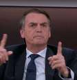 O presidente Bolsonaro na tela da GloboNews: relação tensa com as empresas de comunicação da família Marinho  Foto: Reprodução