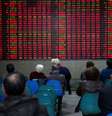 Investidores observam painéis eletrônicos no primeiro dia após Ano Novo em Xangai, China
03/01/2017
REUTERS/Aly Song  Foto: Reuters