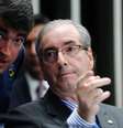 Eduardo Cunha (dir.) em 2015, ao lado de um servidor do Senado  Foto: Senado Federal / BBC News Brasil
