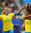 Cristiane, Mônica e Tamires comemoram gol da centroavante na vitória por 3 a 0 sobre a Jamaica, na partida de estreia da Seleção na Copa do Mundo  Foto: Reuters