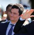 Presidente Jair Bolsonaro e ministro da Justiça, Sergio Moro, chegam para cerimônia em Brasília  Foto: Adriano Machado / Reuters