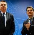 Presidente da República, Jair Bolsonaro, e o Ministro de Estado da Segurança Pública, Sérgio Moro, durante solenidade de assinatura da MP para Confisco de Bens de Traficantes.  Foto: Carolina Antunes / PR