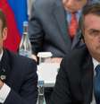 Macron disse que Bolsonaro mentiu ao dizer que atuaria contra o desmatamento, em encontro do G20 em junho, onde sentaram lado a lado  Foto: AFP / BBC News Brasil