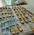 Agentes encontraram R$ 600 mil no apartamento.  Foto: Divulgação / MP-PR
